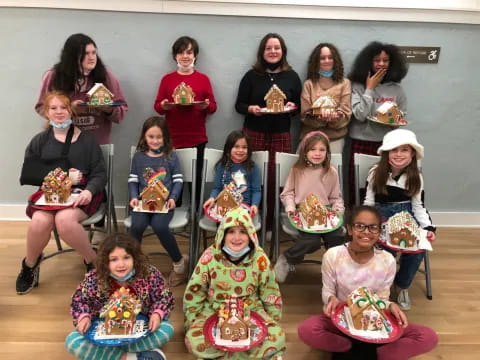 a group of people holding food