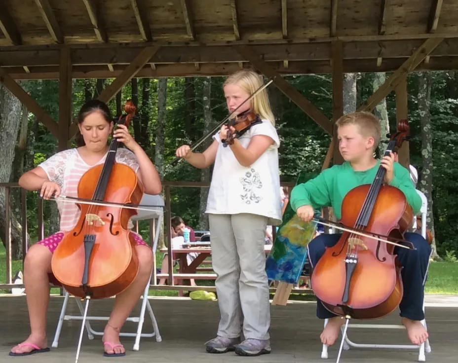 a group of people playing instruments