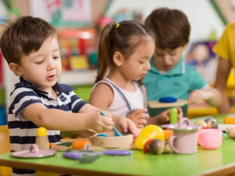 a group of children playing with toys