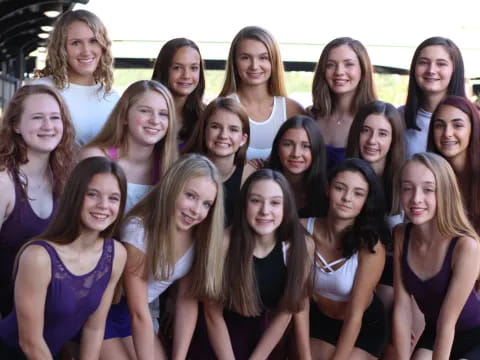 a group of women posing for a photo