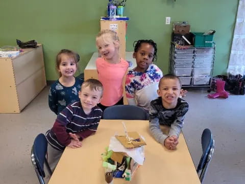 a group of children sitting on the floor