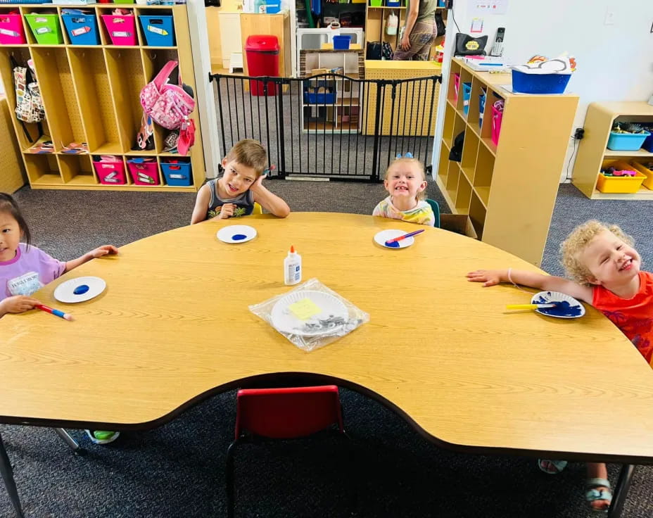 kids sitting at a table