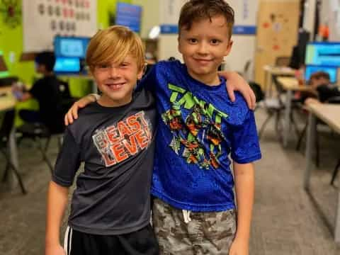 two boys posing for a picture