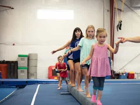 a group of girls in a gym