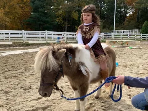 a girl riding a horse