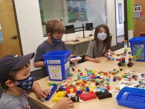 a group of children playing with toys