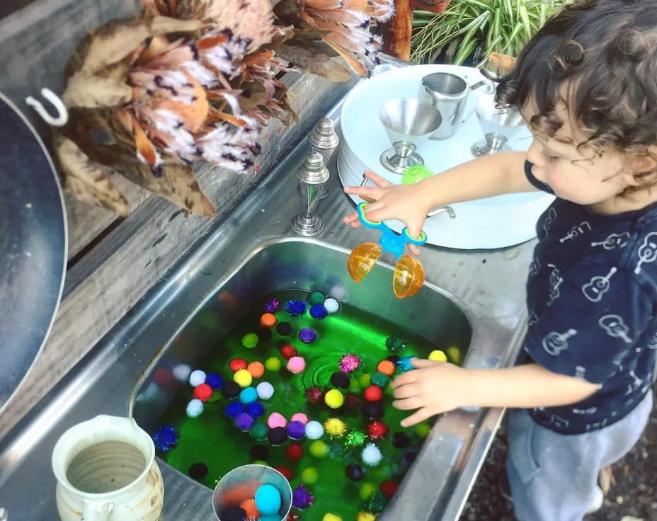 a child playing with a toy