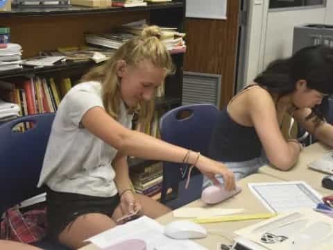 a few women working at a table