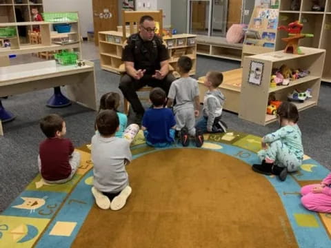 a group of children sitting on the floor