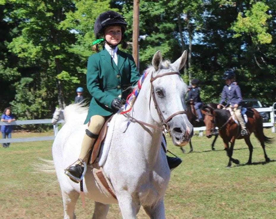 a man riding a horse