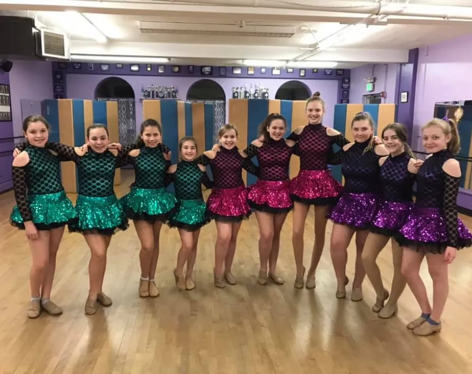 a group of girls in a dance class