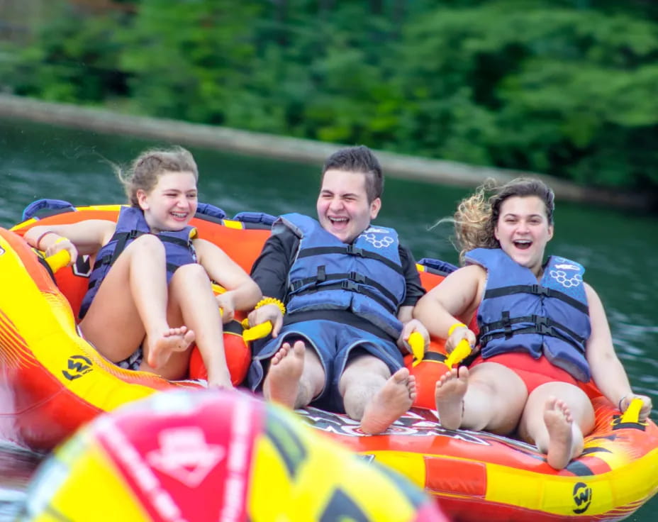 a group of people in a raft