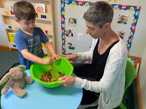 a person and a child eating food