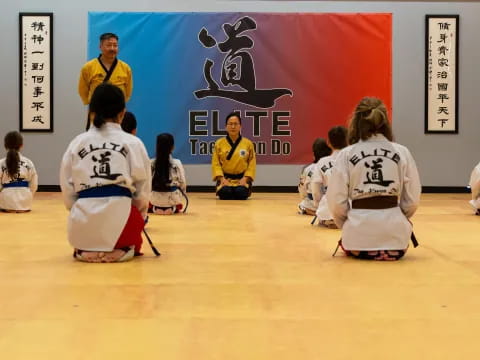 a group of people sitting on the floor