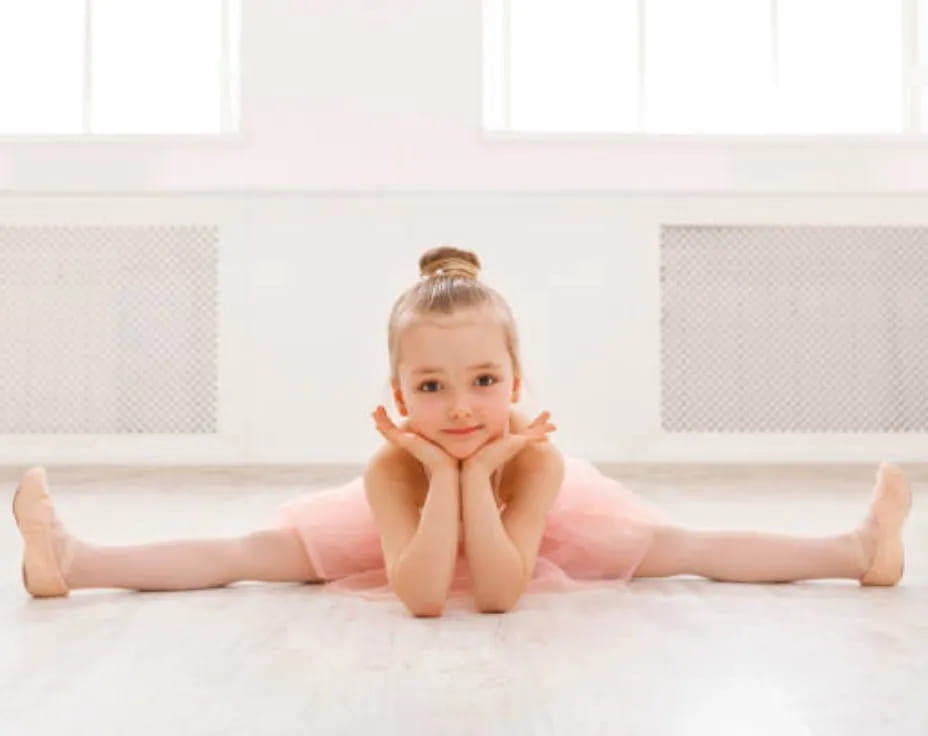 a baby lying on the floor