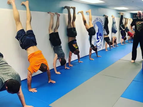 a group of people doing yoga