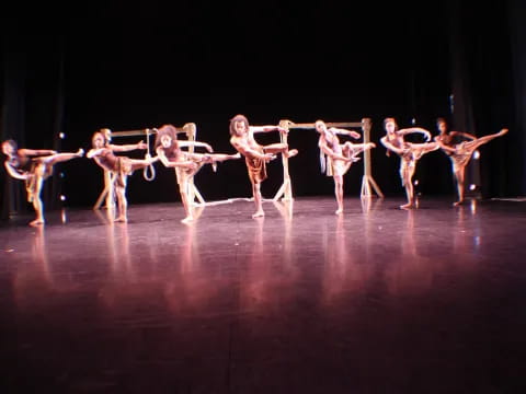 a group of dancers on a stage