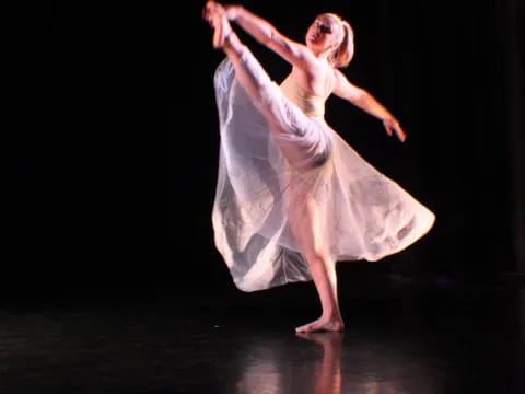 a person dancing on a stage