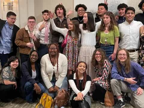 a group of people posing for a photo