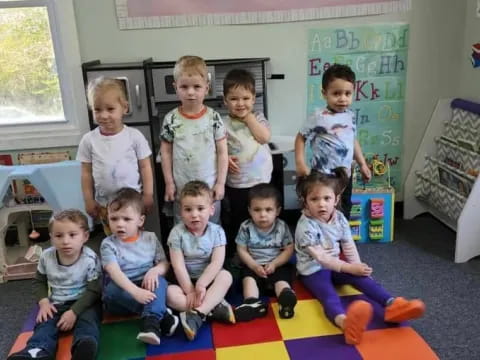 a group of children posing for a photo