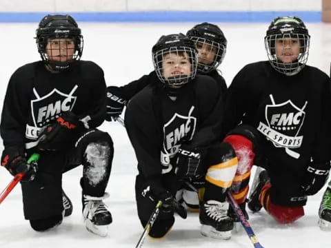 a group of people wearing hockey gear
