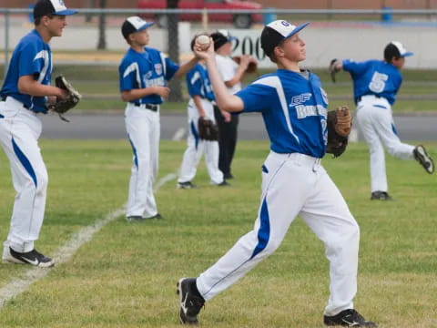 a baseball player throwing a ball