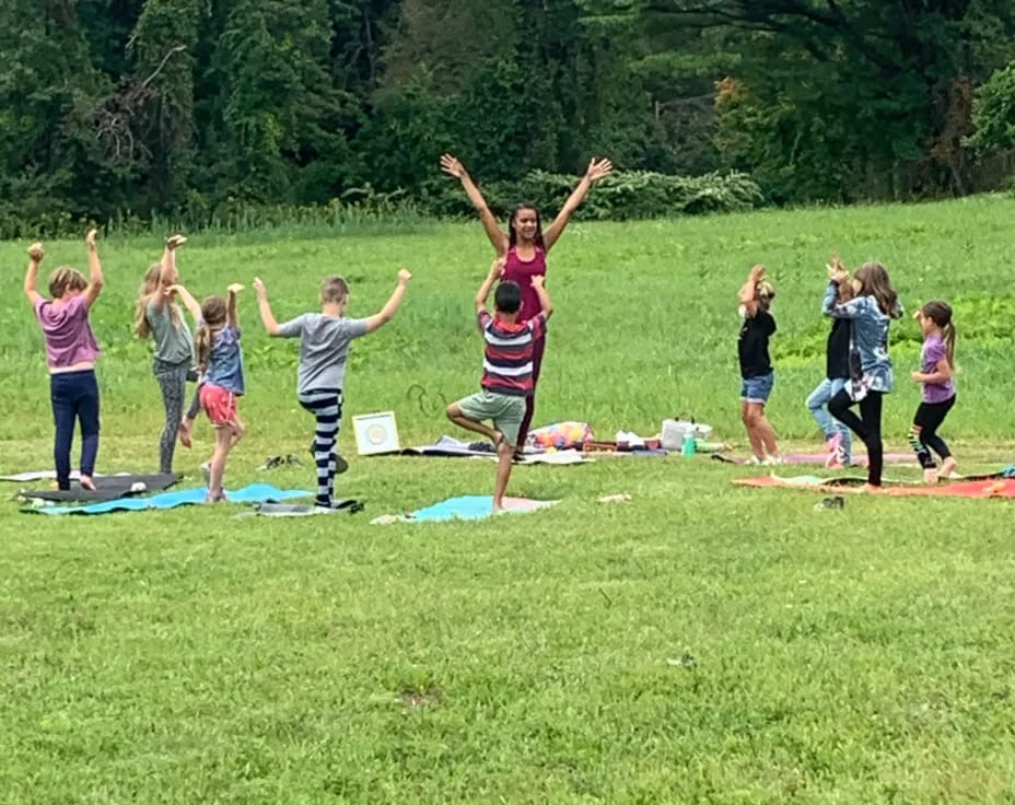 a group of people jumping in the air