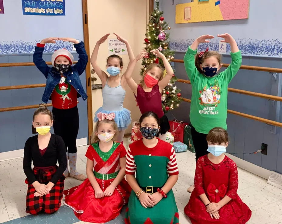 a group of children wearing clothing