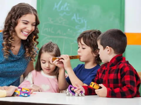 a teacher teaching her students