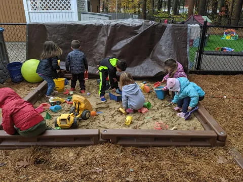 children playing in the sand