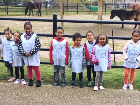 a group of children posing for a photo