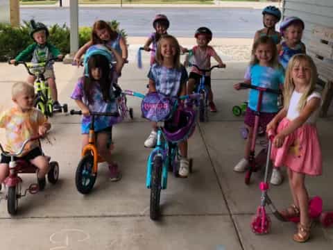 a group of children on bicycles