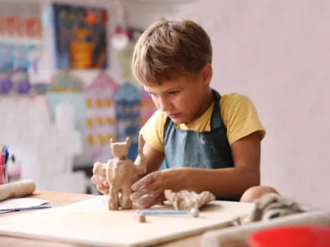 a child sitting at a desk