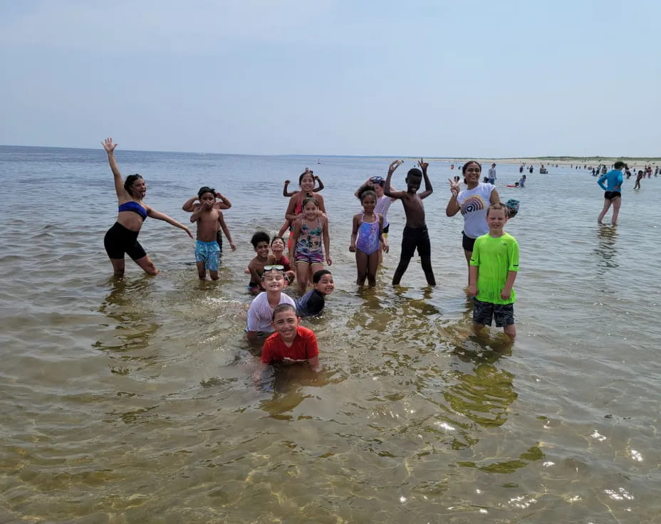 a group of people in the water