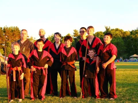 a group of people in red robes