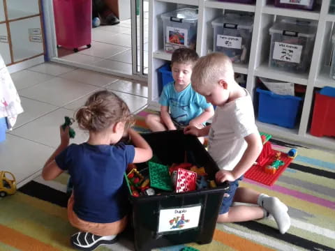 a group of kids playing with toys