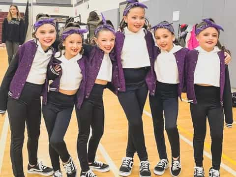 a group of girls in a gym