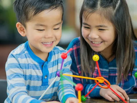 a boy and girl smiling