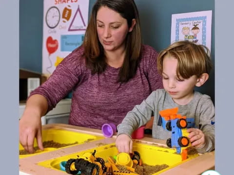 a woman and a boy playing with a toy train