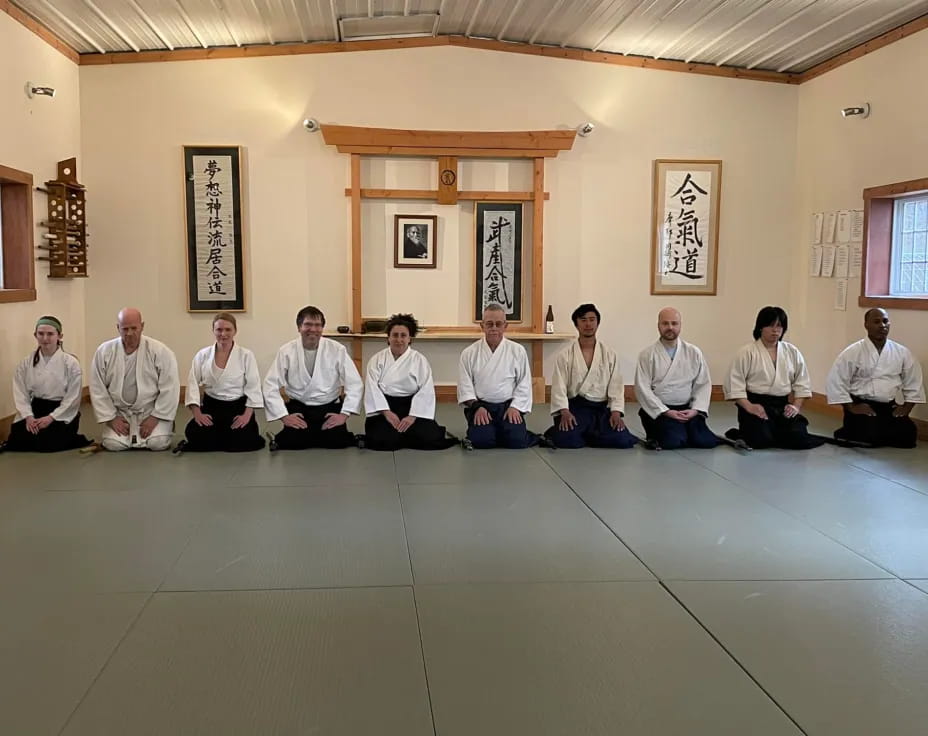 a group of men sitting on the floor