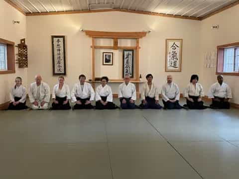 a group of men sitting on the floor