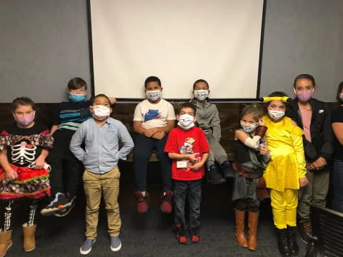 a group of people wearing face masks