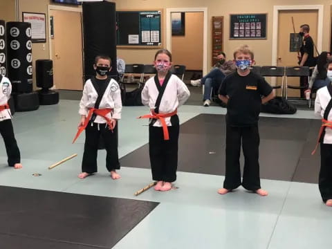 a group of people wearing masks