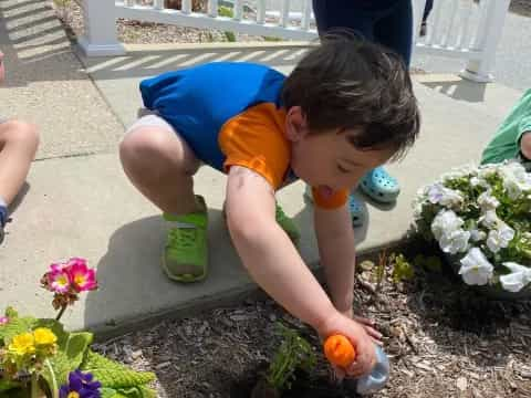 a child digging in the dirt