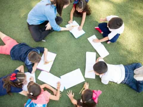 a group of people doing a circle