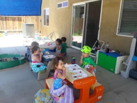 children playing with toys in a room