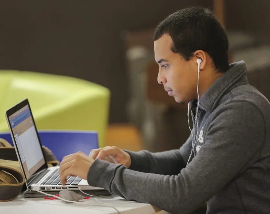 a man using a laptop