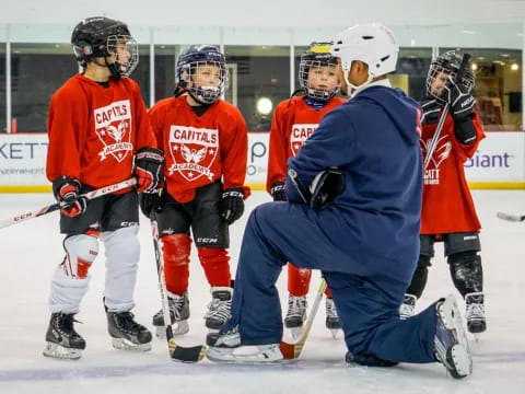 a group of hockey players on ice