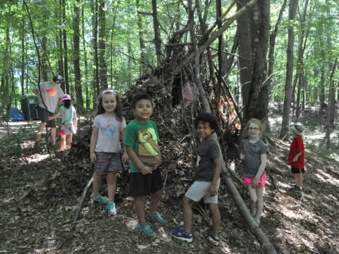 a group of children in the woods