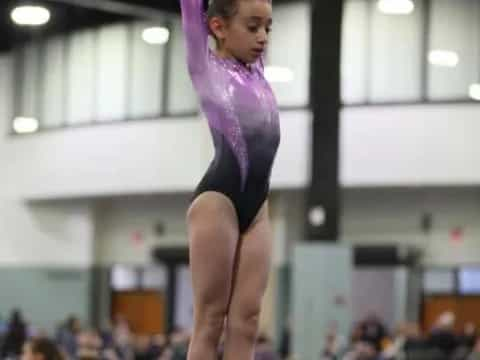 a woman doing gymnastics